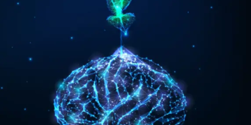 Futuristic growing mindset concept with glowing low polygonal green plant growing from human brain isolated on dark blue background. Modern wireframe design vector illustration