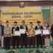 foto bersama siswa berprestasi bersama wali murid, kepala sekolah serta jajaran PDM Kota Pasuruan/foto Fiqo pasmu.id