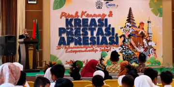 Sambutan Suyatno, S.Pd, Kepala SD MuCES dalam Pisah Kenang & Kreasi, Prestasi, Apresiasi tahun 2026 di Kebon Pring. (Foto: Fiqo/pasmu.id)